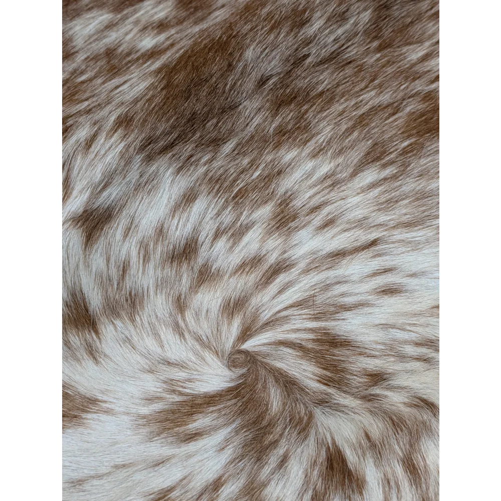 Extra large cowhide rug with brown and white speckled faux fur scarf