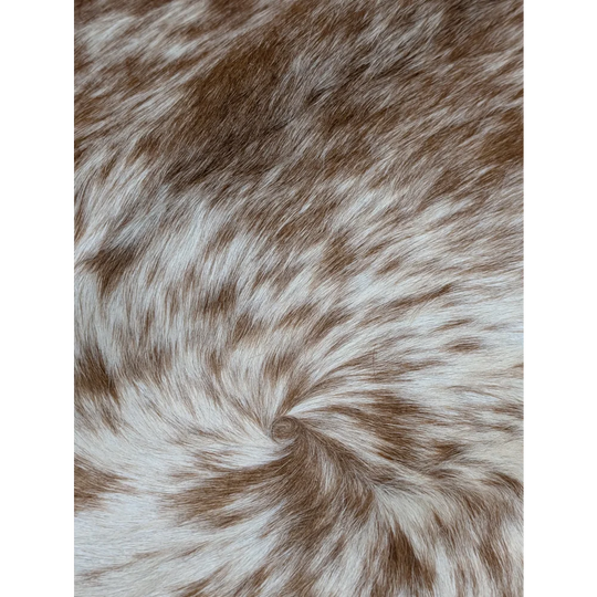 Extra large cowhide rug with brown and white speckled faux fur scarf