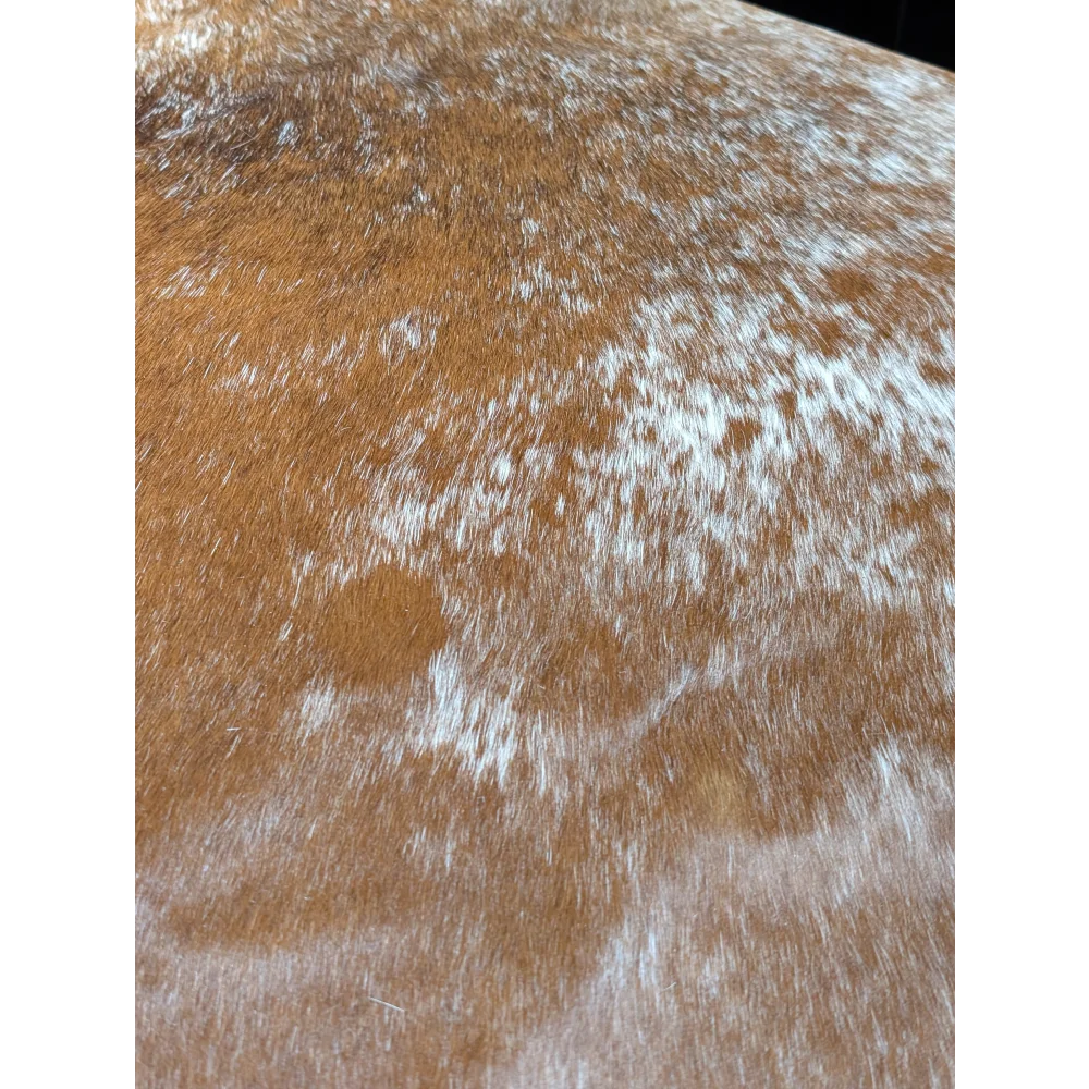 Extra large cowhide rug with golden fur, white speckles, plush texture, unmistakable aura