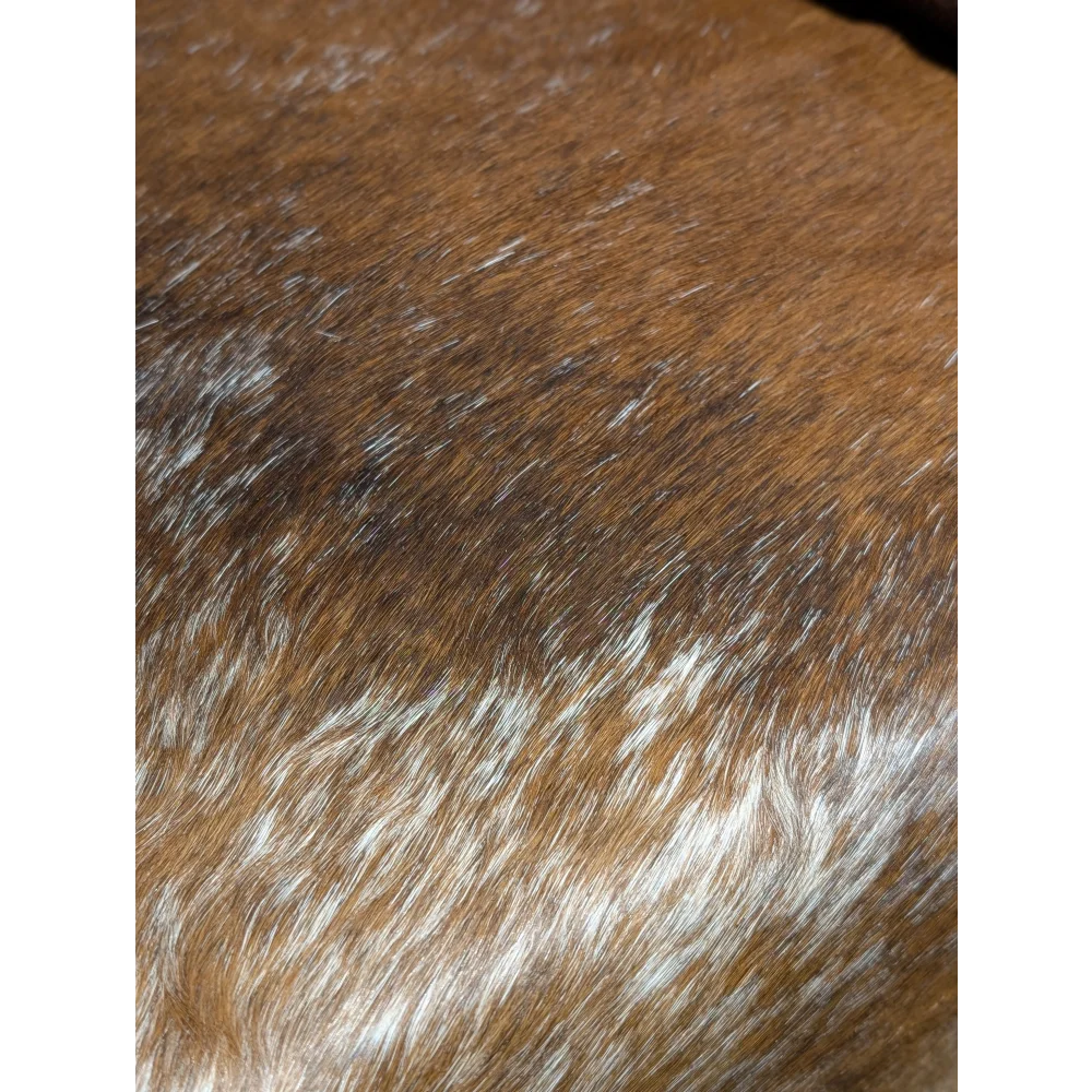 Extra large cowhide pillow cover with brown and white fur texture and unmistakable aura