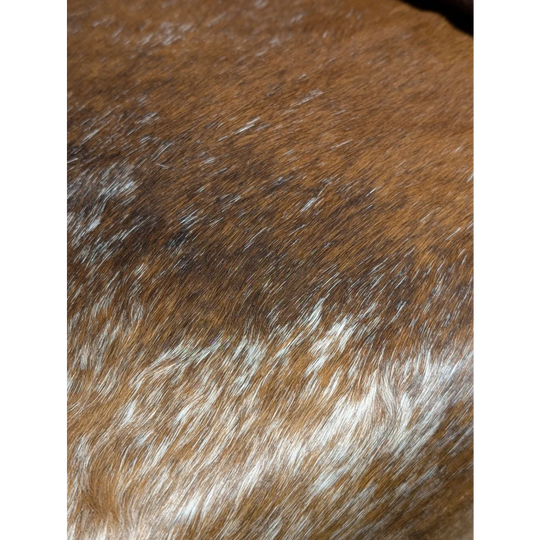 Extra large cowhide pillow cover with brown and white fur texture and unmistakable aura
