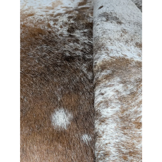 Extra large cowhide rug with brown white spots and leather texture