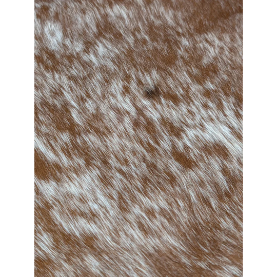 Extra large cowhide rug with brown and white speckled texture