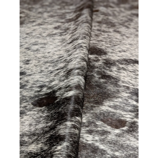 Black and white speckled extra large cowhide rug by Angus Oliver, 94x84 wool texture