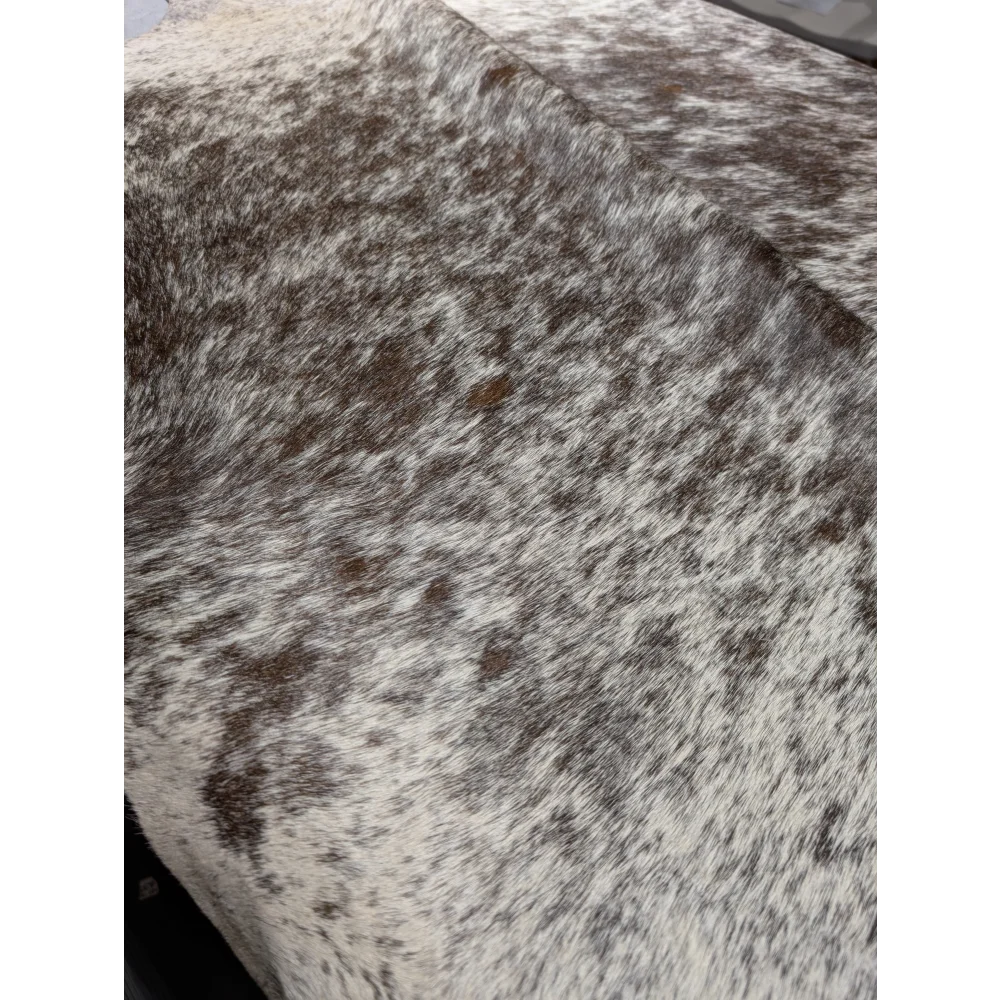 Extra large Angus Oliver cowhide rug in brown white speckled pattern 94x84