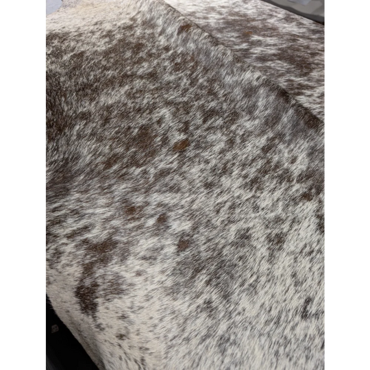 Extra large Angus Oliver cowhide rug in brown white speckled pattern 94x84