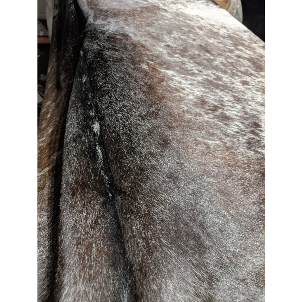 Angus Oliver extra large cowhide rug in gray brown fur with black accents