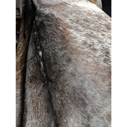 Angus Oliver extra large cowhide rug in gray brown fur with black accents