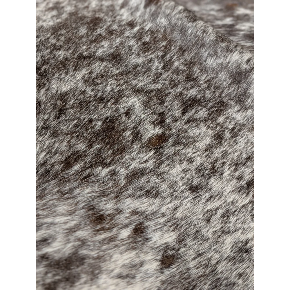 Angus Oliver extra large cowhide rug with gray white speckled wool scarf