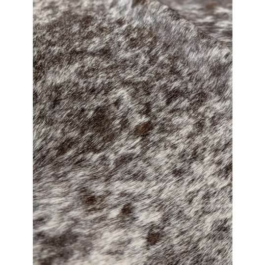 Angus Oliver extra large cowhide rug with gray white speckled wool scarf