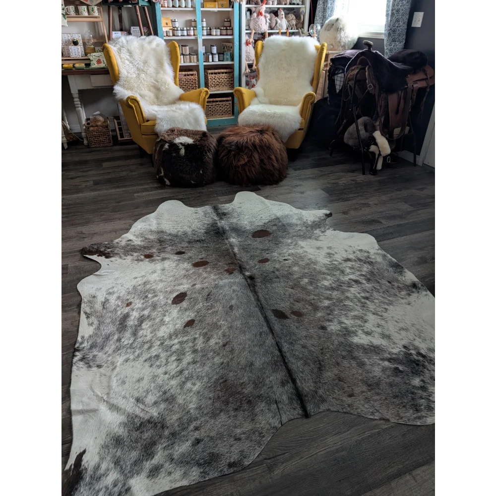 A gorgeous extra large cowhide rug saltpepbrn