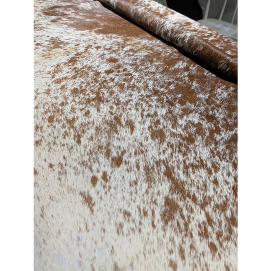 Extra large cowhide rug with brown white speckled wallet texture