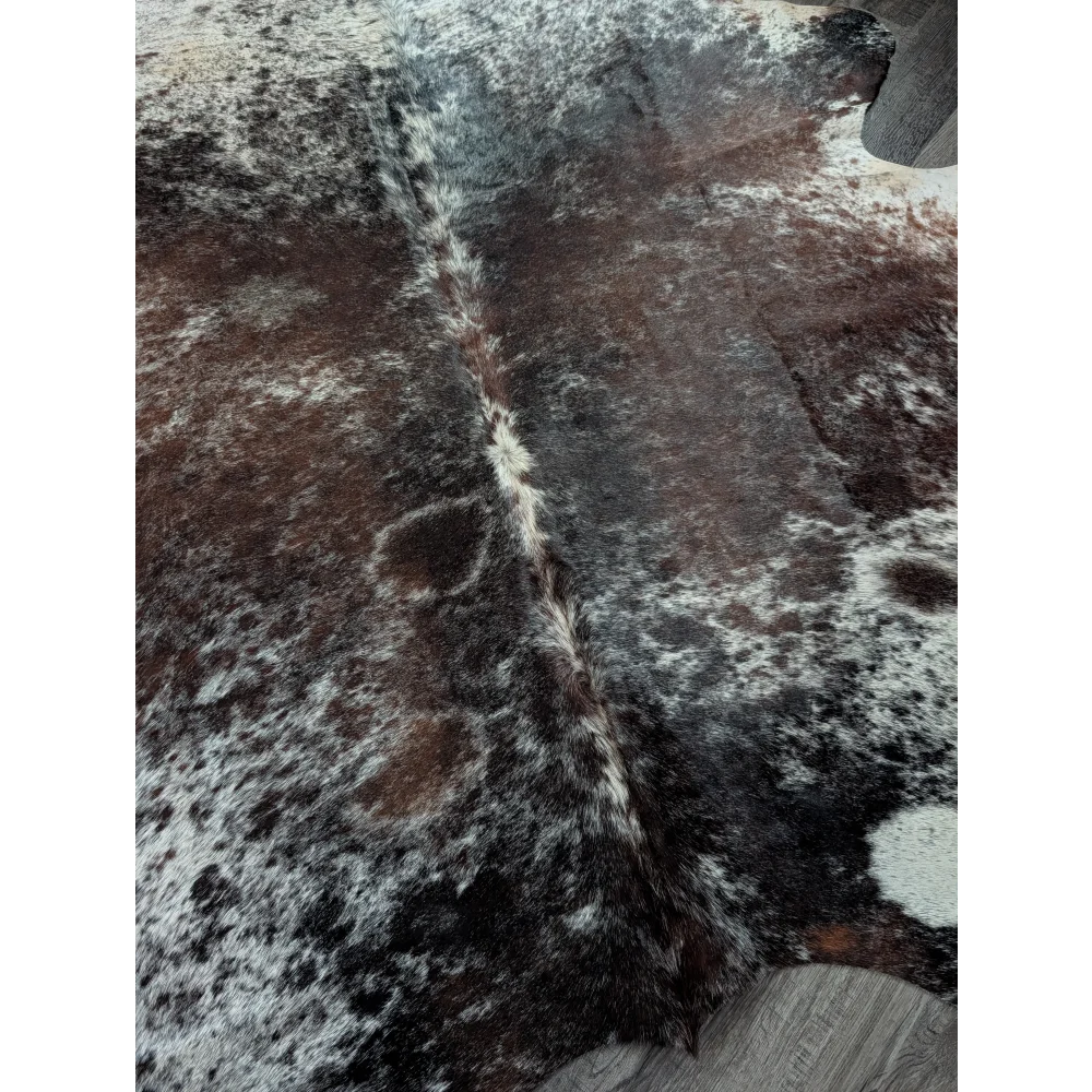 Brown and white speckled extra large cowhide rug with natural fur texture perfect for beautiful rugs and decor