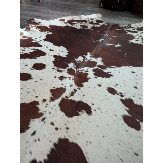 Extra large cowhide rug saltpepbrn198 with brown and white natural patches for beautiful rugs and home decor