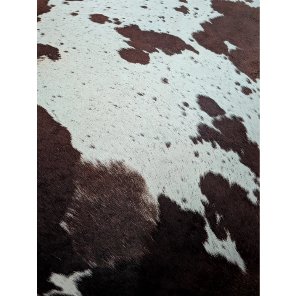 Large cowhide brown and white saltpepbrn198 rug with natural textured surface extra large cowhide beautiful rugs