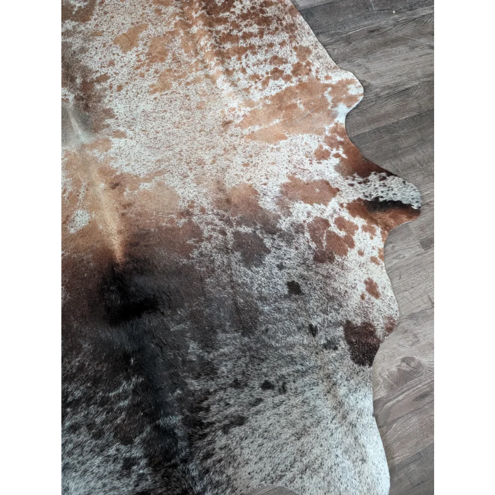 Brown and white extra large cowhide rug saltpepbrn203 with natural irregular edges perfect for beautiful rugs