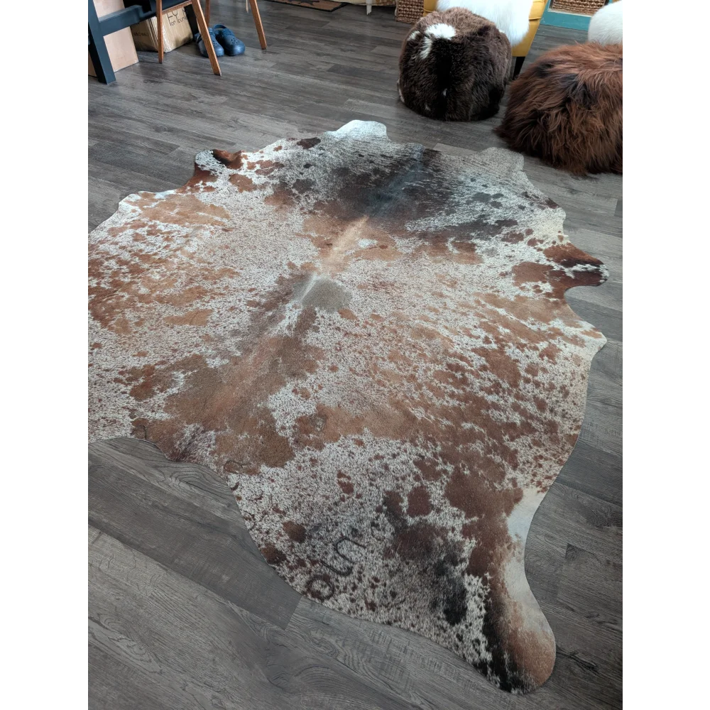 Brown and white extra large cowhide rug saltpepbrn203 with natural irregular edges perfect for beautiful rugs