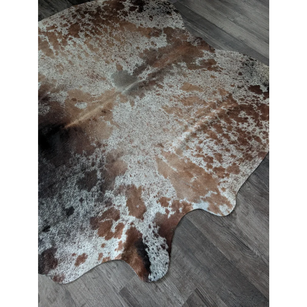 Brown and white spotted extra large cowhide rug saltpepbrn203 with natural irregular edges perfect for beautiful rugs