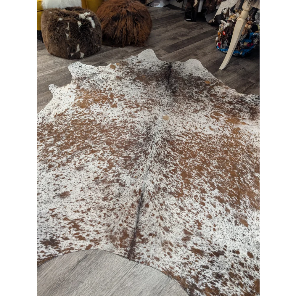 Brown and white spotted extra large cowhide rug saltpepbrn31 with natural irregular edges 98 by 86 inches