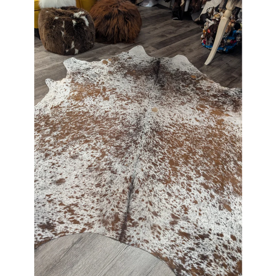Brown and white spotted extra large cowhide rug saltpepbrn31 with natural irregular edges 98 by 86 inches