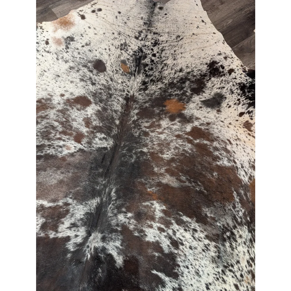 A natural extra large cowhide rug with striking white black and brown patches saltpepbrn38 96 x 83 inches