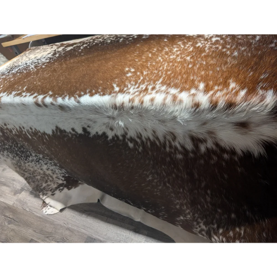 Extra large brown and white cowhide rug with textured pattern from Ralph Lauren Home