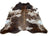 Extra large brown and white cowhide rug with natural fur texture offering rustic charm and unique characteristics arriving soon
