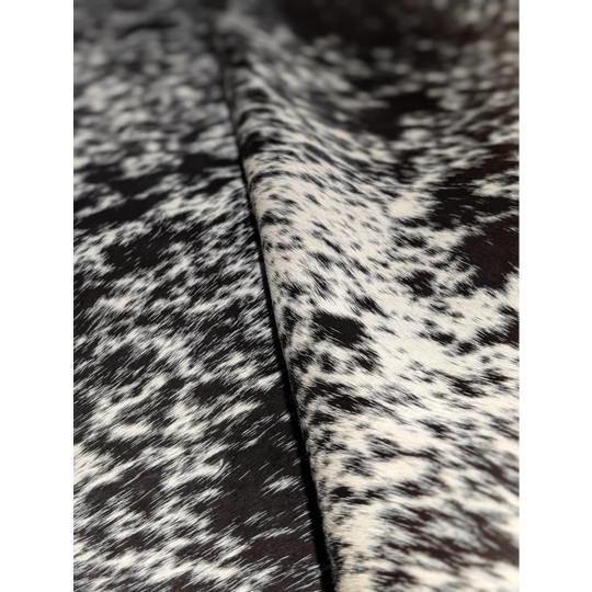 Extra large cowhide rug with black white speckled texture, soft underfoot