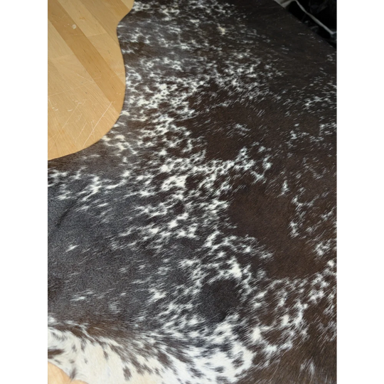 Extra large cowhide rug with black and white speckled pattern, soft underfoot