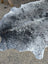 Large cowhide rug saltpeptricolour#478 with unique black and white speckled pattern adds rustic charm to any room