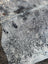 Large saltpeptricolour cowhide rug with gray white speckles and natural black spots offering rustic charm and unique characteristics