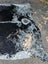 Large cowhide rug saltpeptricolour#479 with black and white spotted pattern and unique rustic charm