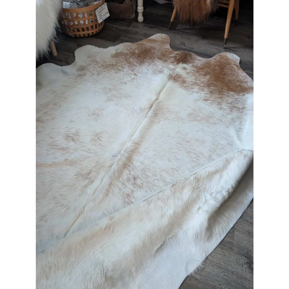 A soft large cowhide rug salty2 by angus oliver in natural white and tan perfect for beautiful rugs lovers