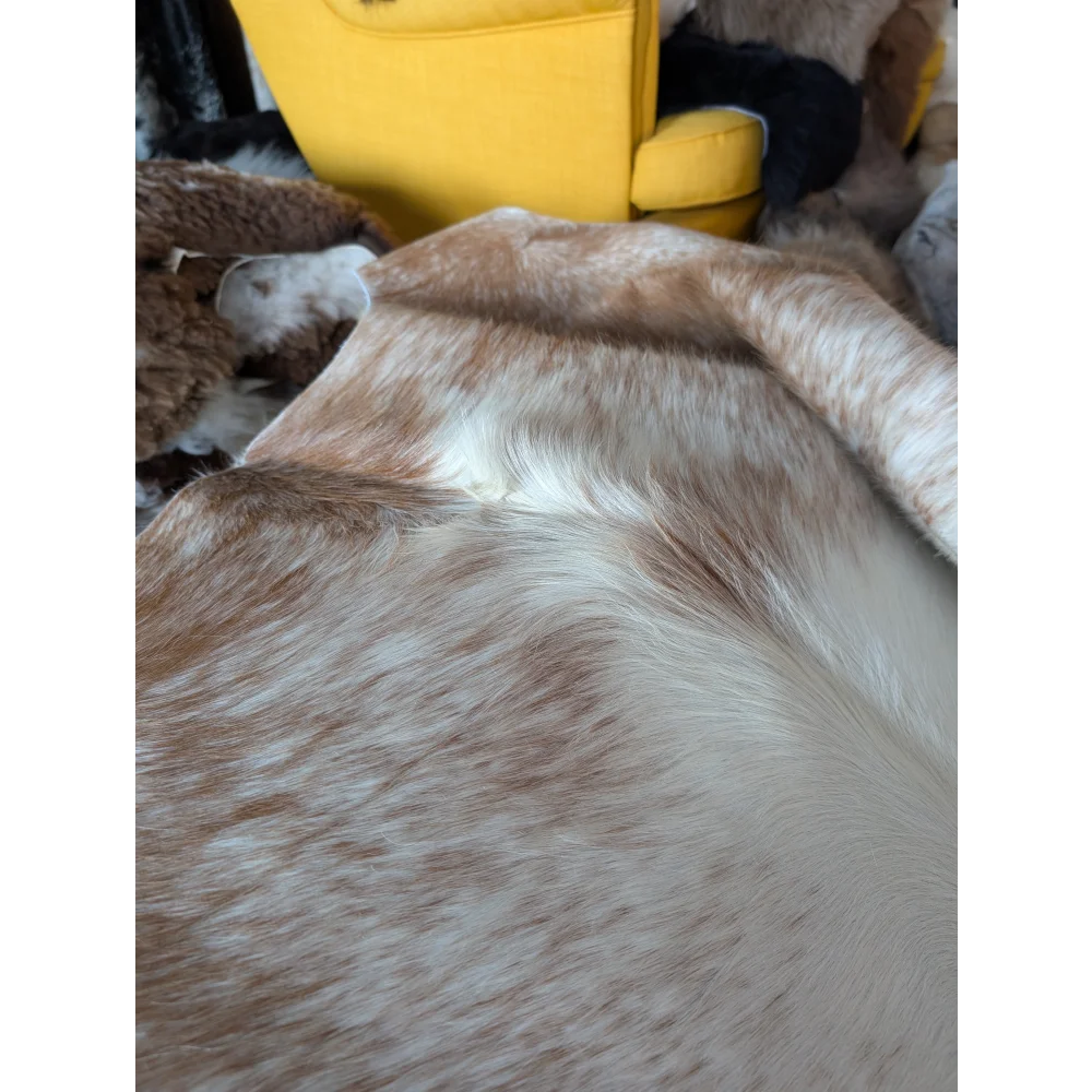 Salty2 large cowhide rug by angus oliver with soft beige and white natural tones perfect for beautiful rugs lovers