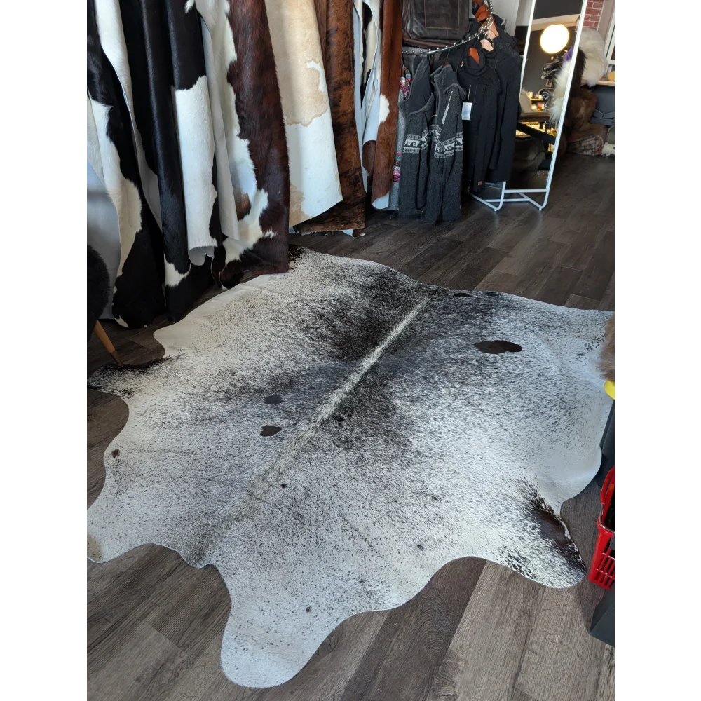 Salty3 extra large cowhide rug with white base and black splotches adds rustic charm to beautiful rugs collection