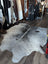 Salty3 extra large cowhide rug with white base and black splotches adds rustic charm to beautiful rugs collection
