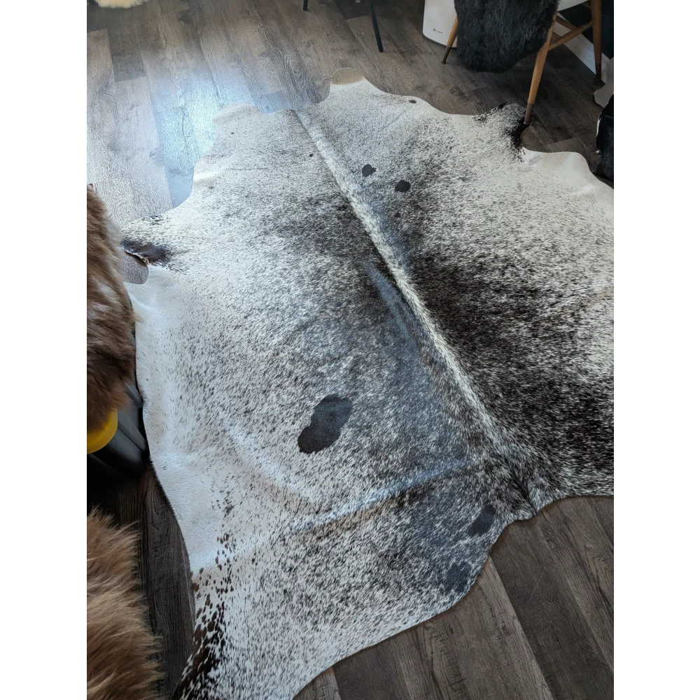 Salty3 extra large cowhide rug with white base and black splotches adds rustic charm to your space with beautiful rugs