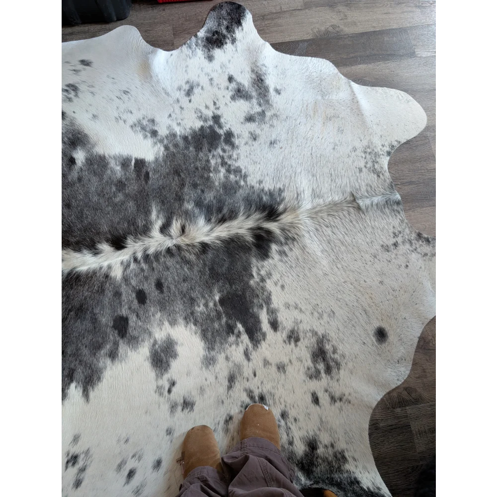 Salty4 large cowhide rug with extra large black and white spotted pattern bringing rustic charm to any space