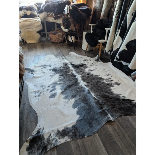 Large black and white cowhide rug salty4 with natural fur texture perfect for adding rustic charm to any space