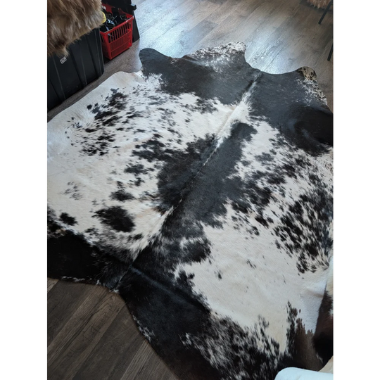 Black and white large cowhide rug salty5 with natural irregular patches adds rustic charm to beautiful rugs collection