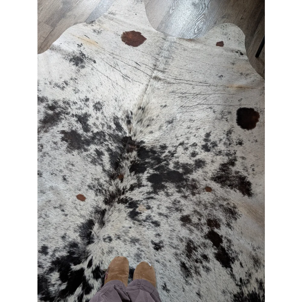 Large cowhide rug salty9 with white black and brown patches features a soft textured surface and rustic charm