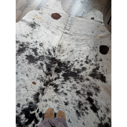 Large cowhide rug salty9 with white black and brown patches features a soft textured surface and rustic charm