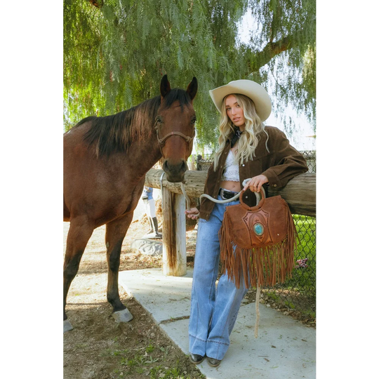 Sedona tassle bag in saddle brown with leather fringe and turquoise stone
