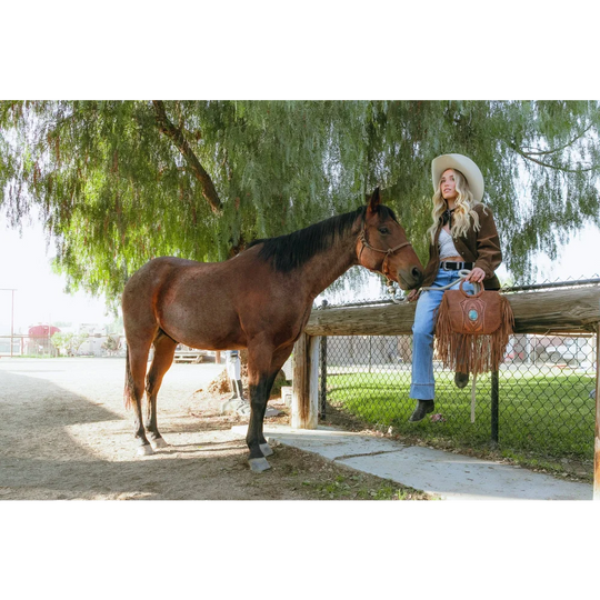 Sedona tassle bag in saddle brown with turquoise accent