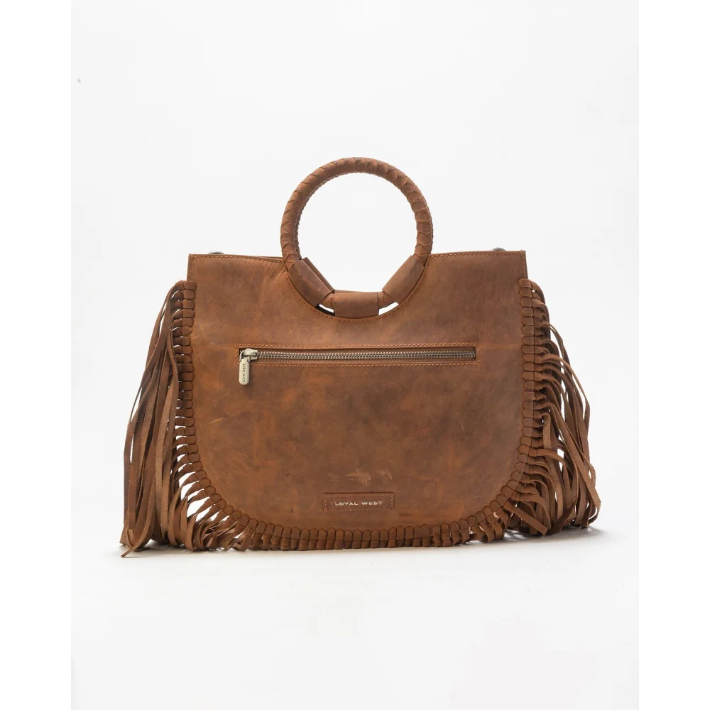 Sedona tassle bag in saddle brown with fringe, circular handle, braids