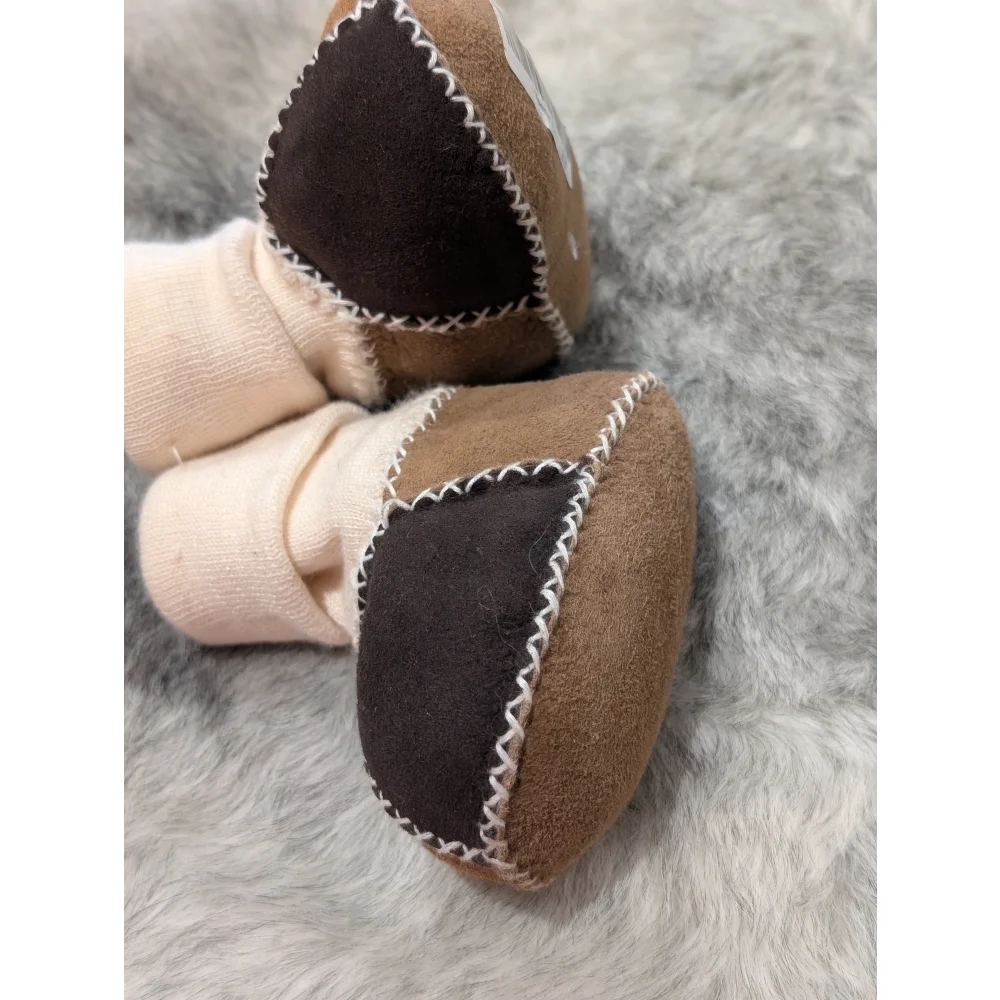 Cute brown patchwork sheepskin baby booties with white stitching, stretchy fabric, fabulous sheepskin baby footwear