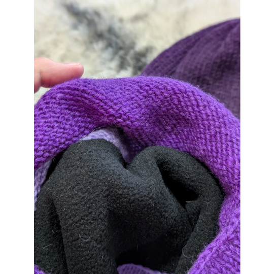 Close-up of purple Moonstone Dip Dye Slouch Balaclava with black fleece lining