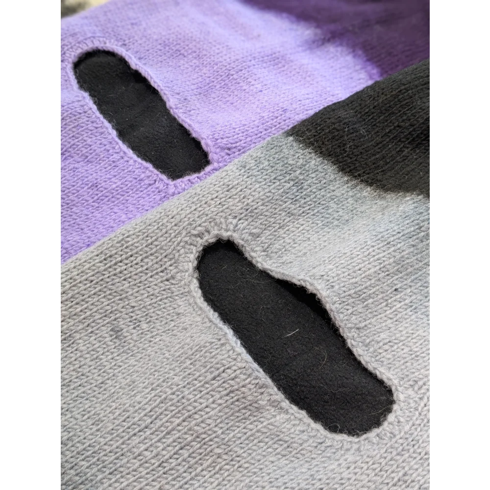 Two knitted fabric swatches with cutouts, purple and gray, from Moonstone Dip Dye set