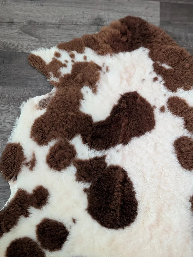Brown and white tibet highland spotted sheepskin rug 40 x 25 inches soft genuine highland spotted sheepskin