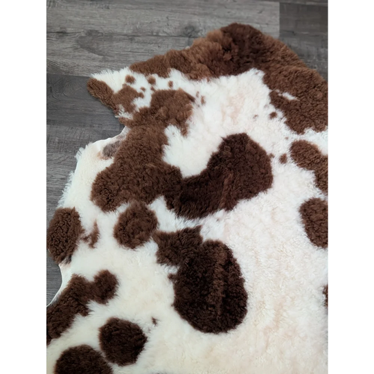 Brown and white tibet highland spotted sheepskin rug 40 x 25 inches soft genuine highland spotted sheepskin